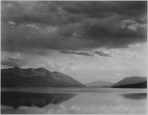 Looking Across Lake Art Print - Looking Across Lake To Mountains And Clouds, "evening, Mcdonald Lake, Glacier National Park, " Montana. Photographs Of National Parks And Monuments, Compiled 1941 - 1942, Documenting The Period Ca. 1933 - 1942.
